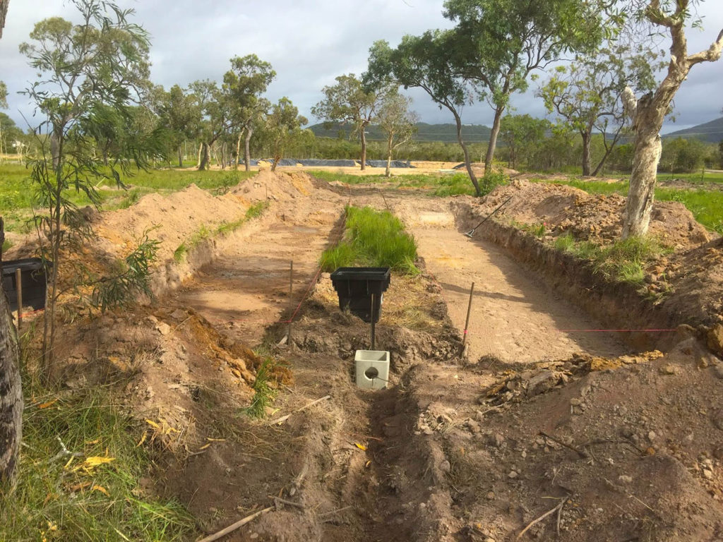 Absorption trenches dug with backhoe