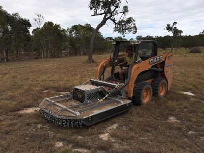 Heavy duty slasher attachment for the Case SR130 skidsteer